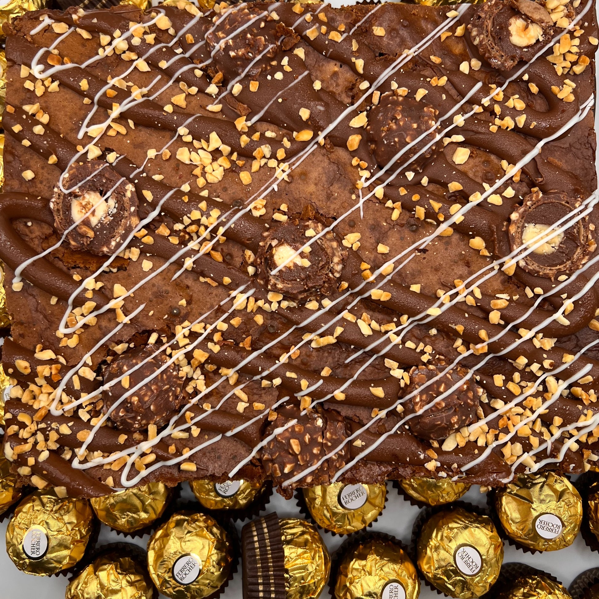 Indulgent Chocoholic Hazelnut Brownie with Nutella and Ferrero Rocher toppings, a treat for chocolate lovers