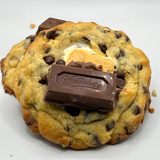 Close-up of The Smores Bliss Cookie with rich chocolate and melted marshmallows